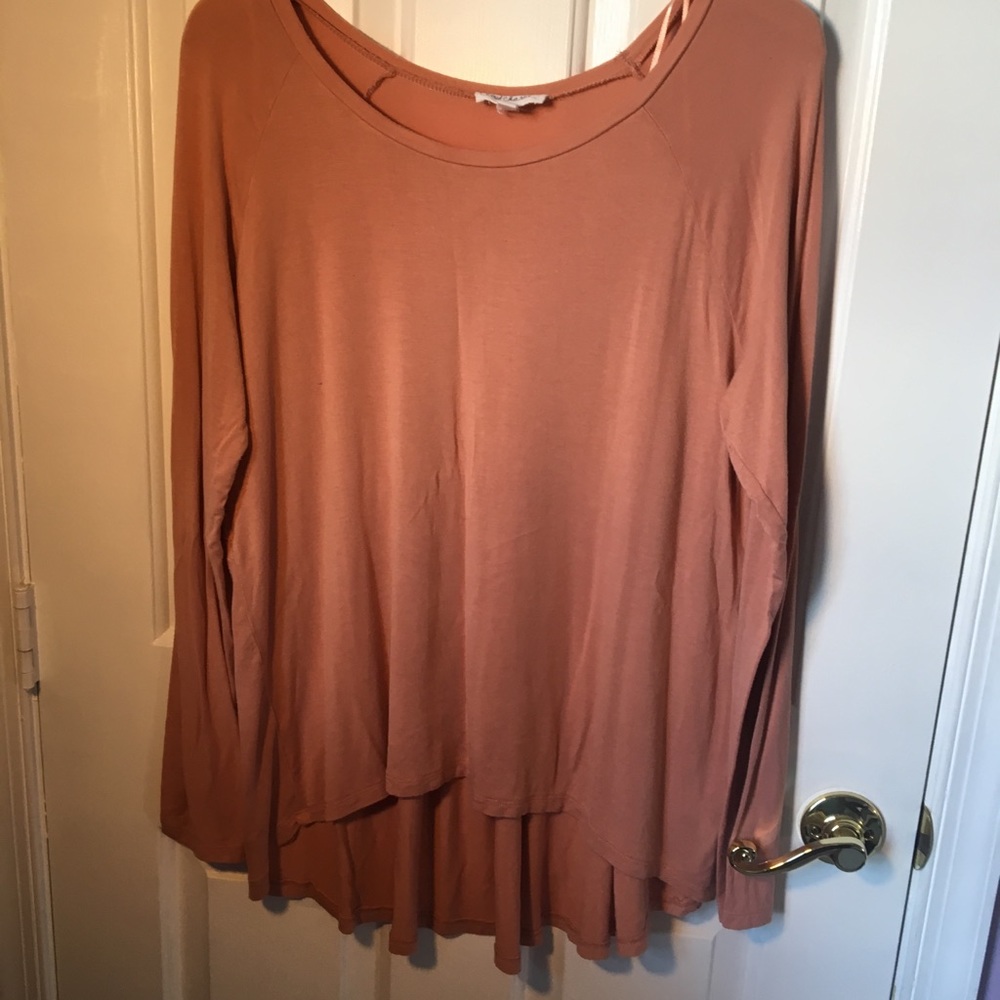 Lightweight long sleeved top with cute back detail